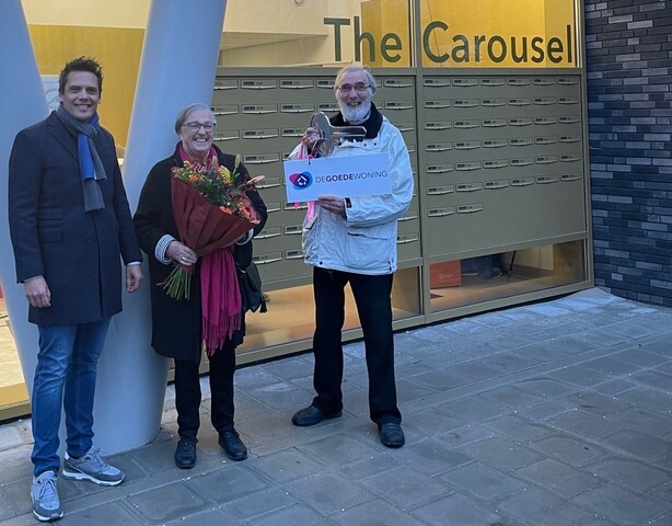 De overhandiging van de symbolische sleutel